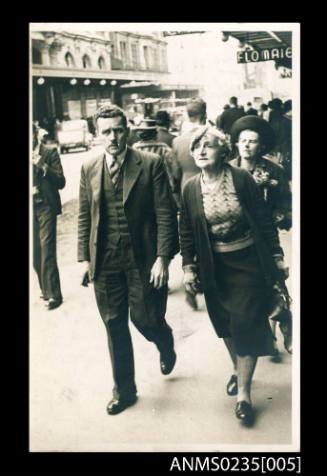 Muriel Binney and one of her sons on a Sydney city street