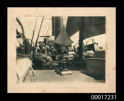 UNTITLED (CREW AND SUPPLIES ON DECK OF NAVAL SAILING VESSEL)