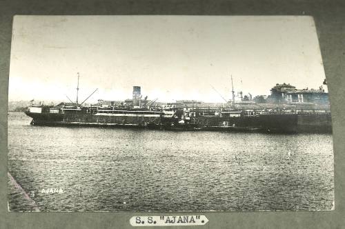 Cargo ship SS AJANA berthed at wharf on port side in harbour – Works ...