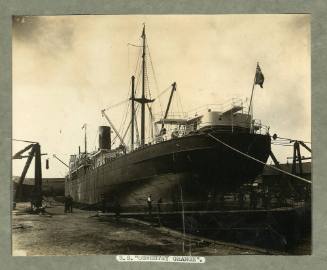 Cargo ship SS OSWESTRY GRANGE berthed in dry dock