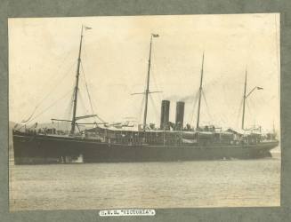 Passenger ship RMS VICTORIA under way off shore