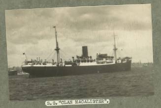 Cargo ship SS CLAN MACALISTER at anchor in harbour