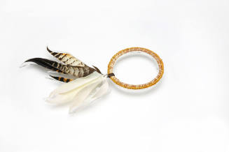 Tiwi armband with feather tuft