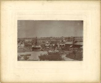 A view of Mort's Dock and the USS NEVADA docked