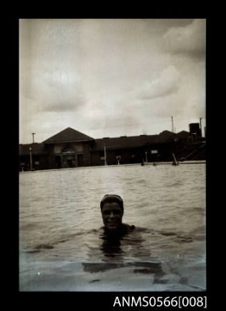 Man swimming training in pool, Australia 1930s