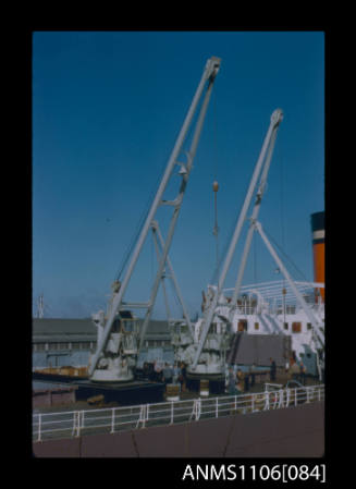 Colour photographic slide of electric jib cranes aboard FREMANTLE STAR