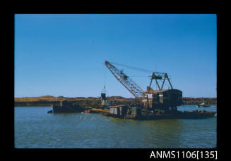 Colour photographic slide of a drag line dredge at Port Kembla