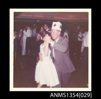 Photograph of a couple dancing at the Crossing the Line ceremony onboard SS STRATHEDEN