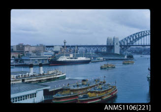 Colour photographic slide of a ship berthed at the Circular Quay passenger terminal