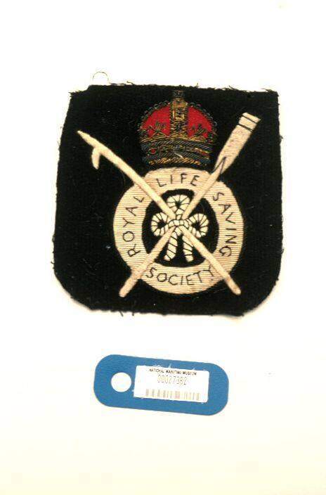 Royal Life Saving society cloth badge worn on a blazer