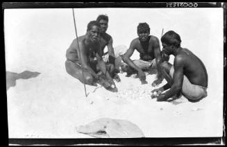 Yawuru men collecting turtle eggs, Broome