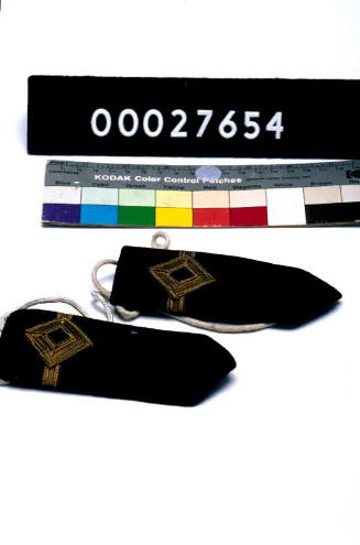 PAIR OF SHOULDER STRAPS OF A THIRD OFFICER.  PART OF A TAILOR'S KIT, THE CASE 00027650, ITS CONTENTS REGISTERED AS 00027651 - 00027736.