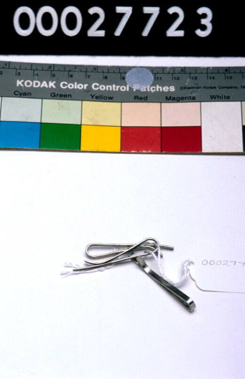 THREE CLIPS TO ATTACH BUTTONS.  PART OF A TAILOR'S KIT, THE CASE 00027650, ITS CONTENTS REGISTERED AS 00027651 - 00027736.