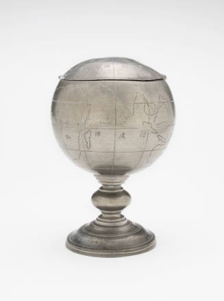 Tea caddy in the form of a globe