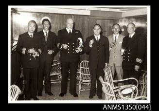 Captain Dun and group of unidentified men