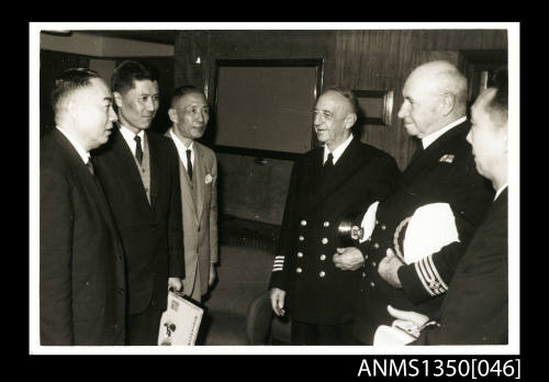 Captain Dun and a group of unidentified men