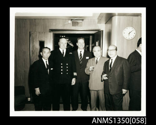 Captain Dun and unidentified men