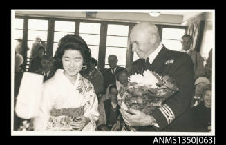 Captain Dun and unidentified Japanese woman