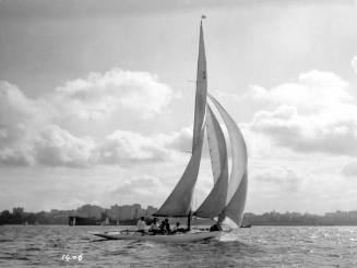 Starboard view of a sloop with the number '2' printed on the mainsail, Sydney Harbour