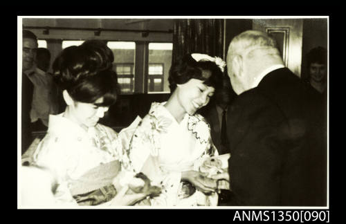 Captain Dun with two Japanese women