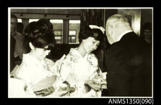 Captain Dun with two Japanese women