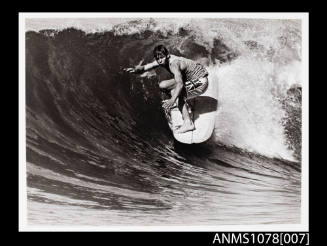 Butch Cooney riding a wave