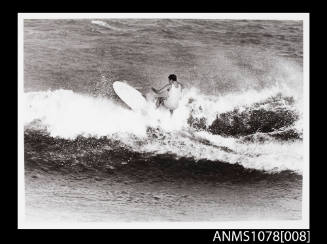 Nat Young riding a wave
