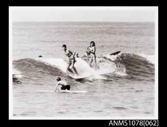 Pearl Turton surfing