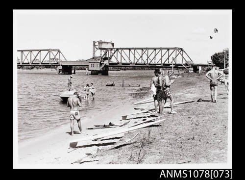 Surfers at Coopernook Creek Bridge