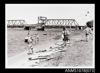 Surfers at Coopernook Creek Bridge