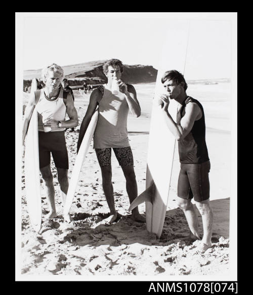 Midget Farrelly, Nat Young and Jeff Spencer drinking milk