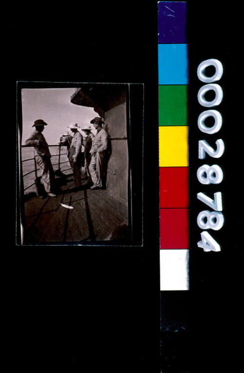 Troops standing on deck of unidentified troopship