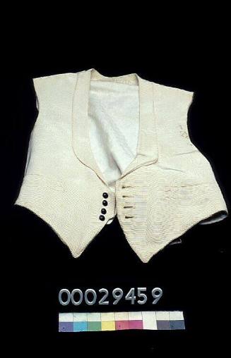 White tuxedo waistcoat with horizontal piping owned by Mr Rector
