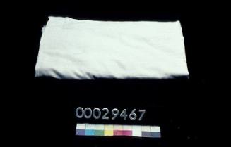 Piece of irregular white linen possibly part of a eiderdown cover, found in schrank-koffer 00028297