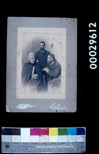 Studio portrait of Robert McKilliam with his mother and brother