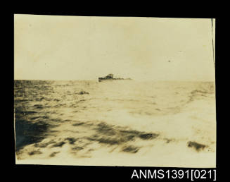 Photograph depicting a war ship at sea