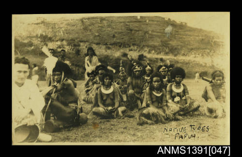 A group of Papuan people in traditional costume