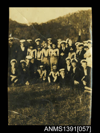 Photograph depicting a group of men in Navy uniform