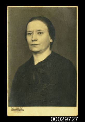 Portrait of middle aged woman in black