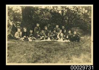 A group of young boys on a picnic