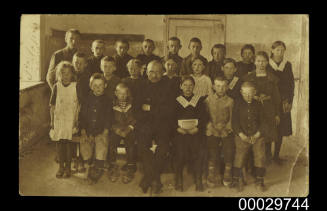 Primary school students with their teacher in Latvia