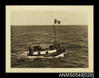 Photograph depicting a small vessel at sea