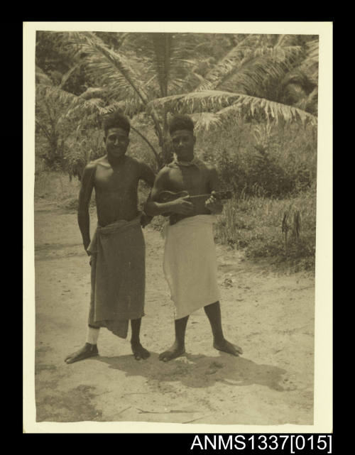 Photograph of two boys in local dress