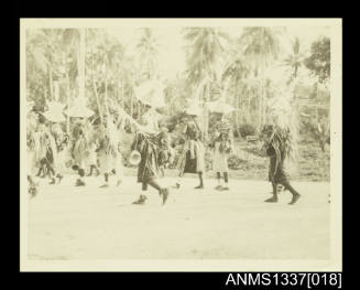 Photograph of locals dancing