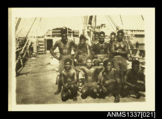 Photograph of a group men onboard