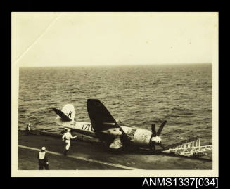 Photograph of RAAF plane falling off flight deck