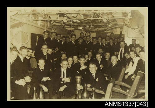 HMAS SYDNEY III crew members having a drink