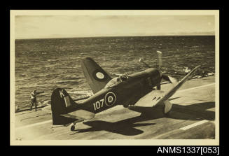 Postcard of plane taxiing after landing on deck of HMAS SYDNEY III
