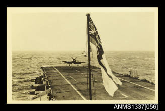 Postcard of plane landing on deck of HMAS SYDNEY III