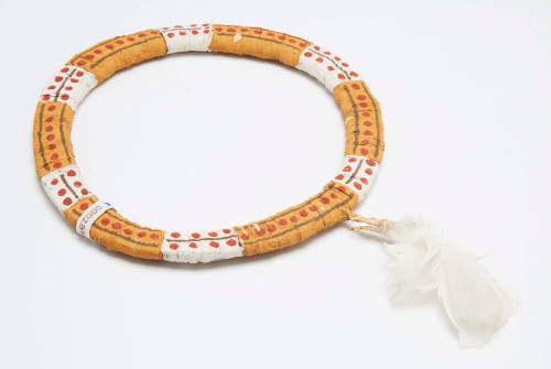 Pukumani ceremonial headband with feather tuft